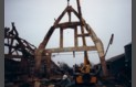 The cruck frame to be used in The  Barn  (our garage) being lifted